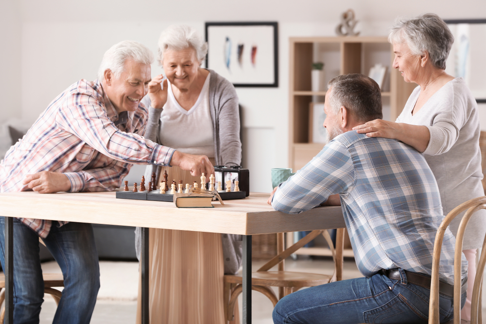 Group of seniors playing chess